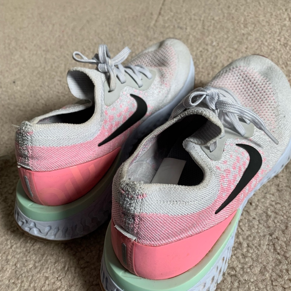 Nike Pink and White Athletic Shoes with Breathable Design .Size 9 Women